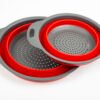 Bicolor collapsible colander on white background. Studio Photo Space-Saving Collapsible Colander
